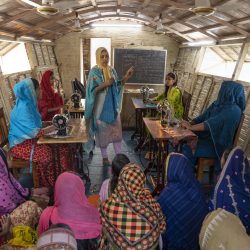 Yeasmin Ara teaches in sewing training course for the village women and girls at a boat at Kukragari, Chatmohor, Pabna. Photo: Abir Abdullah/Shidhulai Swanirvar Sangstha